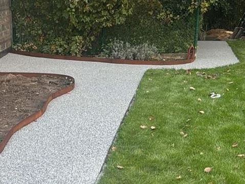 Waterdoorlatend tuinpad Vuba in Eeklo, Zelzate, Ertvelde, Assenede, Bassevelde, Boekhoute, Evergem, Terneuzen, Sas van Gent, Sleidinge, Oosteeklo